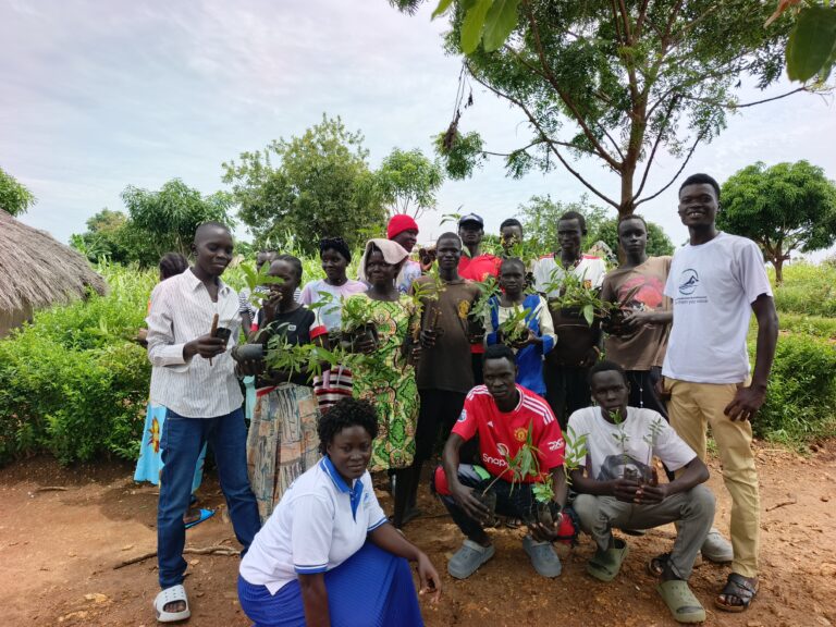 Youths plant 500+ tree seedlings in Bidibidi to protect the environment